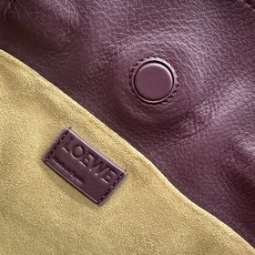 Loewe Новая версия клатча Flamenco из