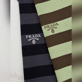 Новая поло-рубашка Prada с полосатым в