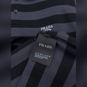 Новая поло-рубашка Prada с полосатым в