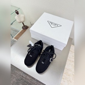 Кроссовки Prada из вымытой парусины, с