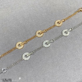 Браслет Bvlgari виде монеты из золота