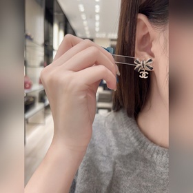 [Серьги Chanel CHANEL 25B с бантиком] 