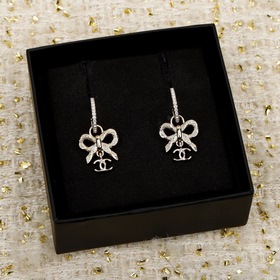 [CHANEL Серьги с двойным «C» и бантико