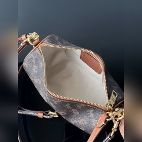 COACH — модель высшей линейки в полной