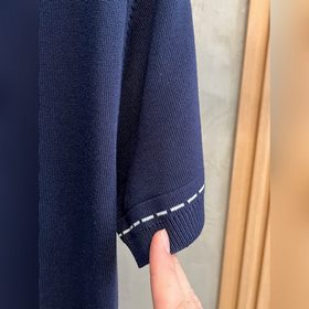 Новая модель трикотажного свитера с ко