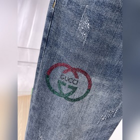 Мужские джинсы GUCCI — модель, предста