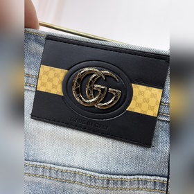 Мужские джинсы GUCCI из ткани «Таннин»