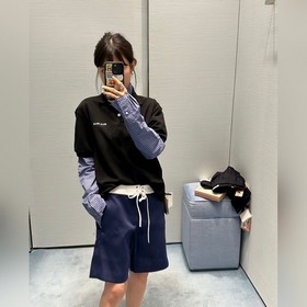 Черная поло-рубашка MIUMIU с вышивкой.