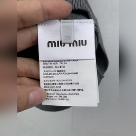 Трикотажный свитер MiuMiu с V-образным