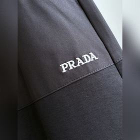Штаны Prada с асимметричным кроем и ши
