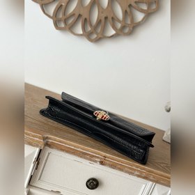 Подержанная чёрная сумочка Chanel с уз