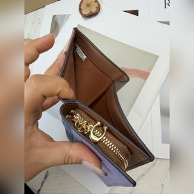 Этот короткий кошелек Coach модели C37