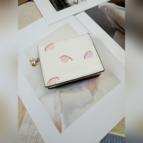 COACH «Улитка» — женский короткий коше