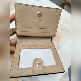 COACH «Улитка» — женский короткий коше