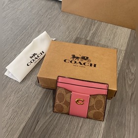 Новая кошелька Coach модели cbD80 такж