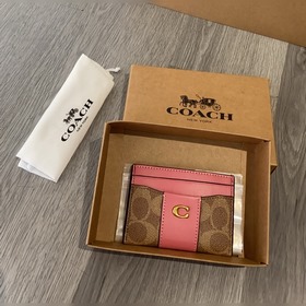 Новая кошелька Coach модели cbD80 такж