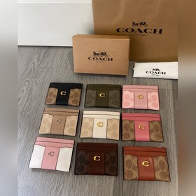 Новая кошелька Coach модели cbD80 такж