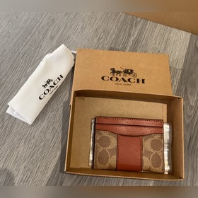 Новая кошелек Coach модели cbD80 также