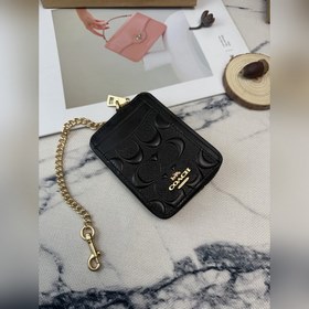 Черный кошелек Coach с металлической ц