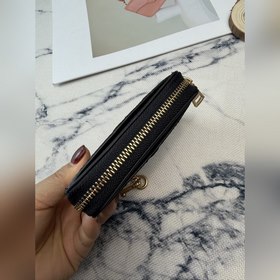 Черный кошелек Coach с металлической ц