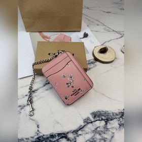 Этот розово-серебристый кошелек Coach
