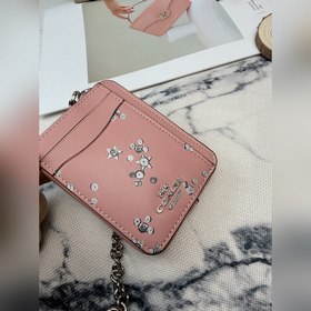 Этот розово-серебристый кошелек Coach 