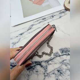 Этот розово-серебристый кошелек Coach 