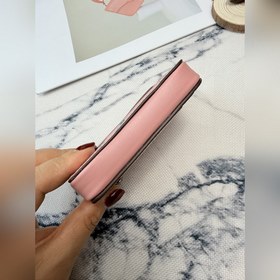 Этот розово-серебристый кошелек Coach 
