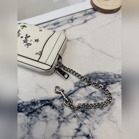 Этот блестящий кошелек Coach с разнооб