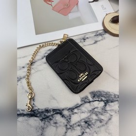 Черный кошелек Coach с металлической ц