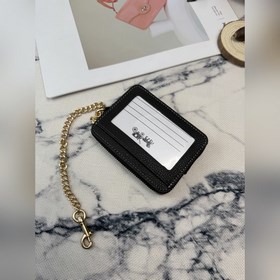 Черный кошелек Coach с металлической ц