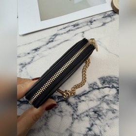 Черный кошелек Coach с металлической ц
