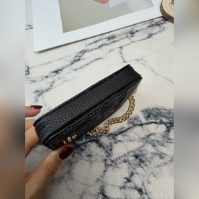 Черный кошелек Coach с металлической ц