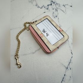 Розовый кошелек Coach с цветочным узор