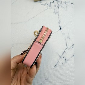 Розовый кошелек Coach с цветочным узор