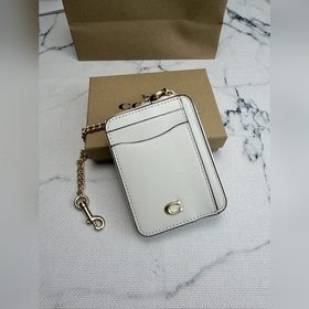 Кошелек Coach с металлической цепочкой