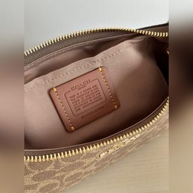 Оригинальная сумка COACH, модель CV933
