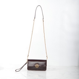 Tory Burch, сумочка-клатч Britten с це