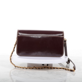 Tory Burch, сумочка-клатч Britten с це