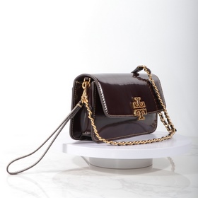 Tory Burch, сумочка-клатч Britten с це