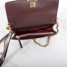 Tory Burch, сумочка-клатч Britten с це