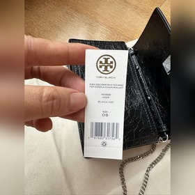 516 Сумка из вощеной кожи Tory Burch —