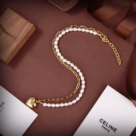 Золотое ожерелье Celine с жемчужным сердцем и необычным дизайном