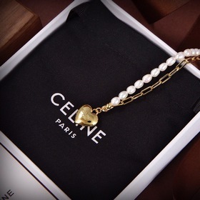 Золотое ожерелье Celine с жемчужным сердцем и необычным дизайном 