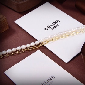 Золотое ожерелье Celine с жемчужным сердцем и необычным дизайном 