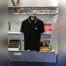 Gucci и Adidas совместно представили вышитую рубашку-поло с корот