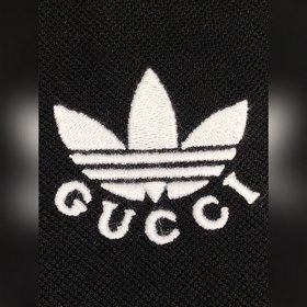 Gucci и Adidas совместно представили вышитую рубашку-поло с корот