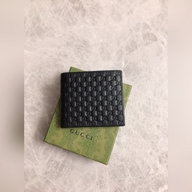 Мужской кожаный кошелек GUCCI, модель 145754 Кожа с тиснением вид