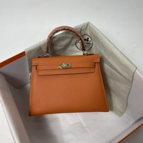 Сумка Hermes KL из кожи Epsom, оранжевая с золотыми серебряными з