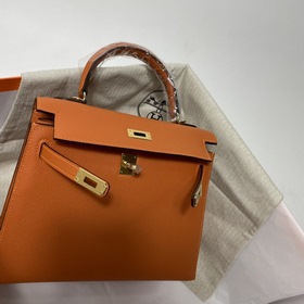 Сумка Hermes KL из кожи Epsom, оранжевая с золотыми серебряными з